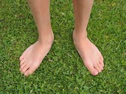 feet point outward when walking
